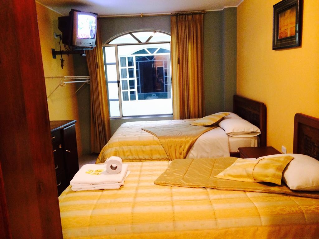 Hostal Grand Rio Baños Стая снимка
